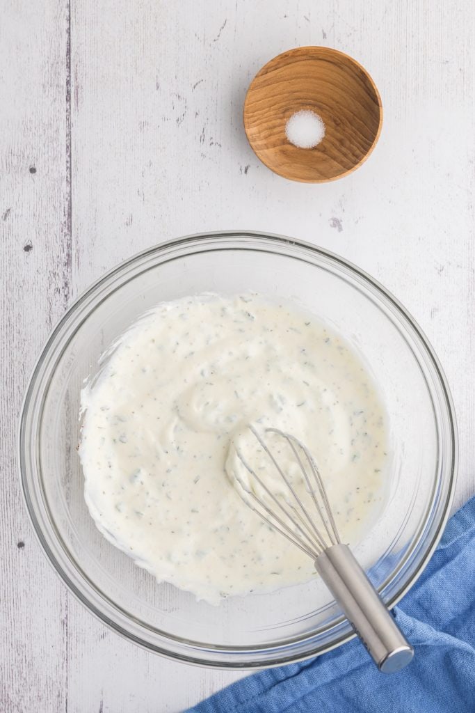 Overhead shot of Greek Yogurt Ranch Dressing after being whipped together with a whisk.