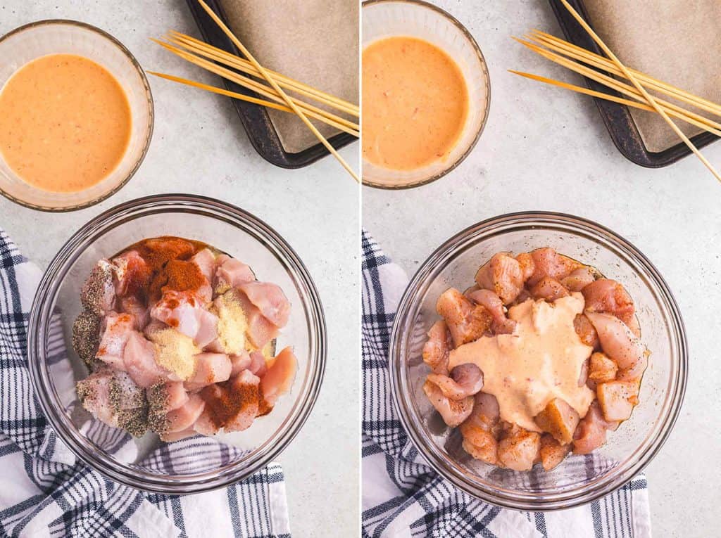 Overhead side by side photos. Photo on the left is a glass bowl filled with the cubed uncooked chicken and sprinkled on top are small piles of salt, pepper, garlic powder, onion powder, paprika, and cayenne pepper. The photo on the right is the glass bowl filled with the raw chicken fully mixed with the spices, and half of the bang bang sauce poured on top.