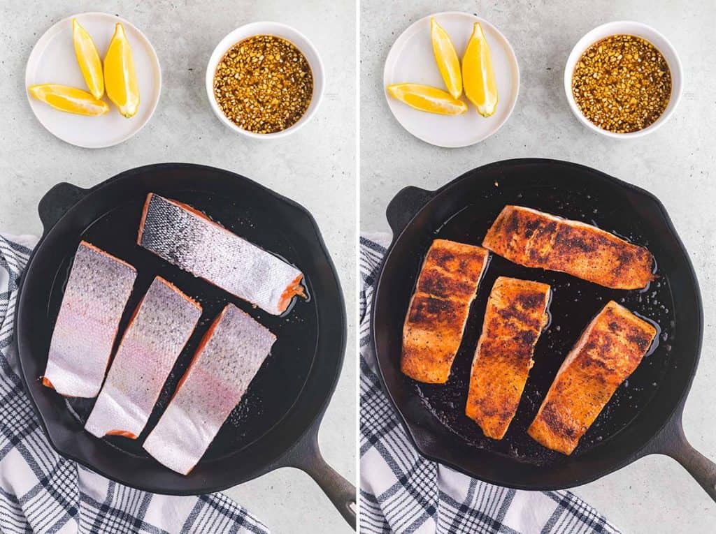A side by side over head shot. The photo on the left shows the salmon being cooked in the black cast iron pan. The silver shiny skin of the salmon is facing the camera while the meaty side is initially cooked. In the photo on the right the salmon has been flipped and now the meaty side is facing upwards and it is a nice golden brown from the initial cooking. In both photos above the fry pan there is a small plate of lemon wedges and a bowl of sauce which will be added next to the fry pan.