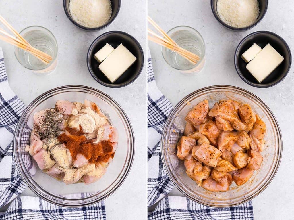 Overhead side by side shots. On the left is a shot of a glass mixing bowl filled with cubed chicken breast and all the seasonings dumped on top. The shot on the right is of the same bowl after all the ingredients have been mixed together. It is a homogenous light orange color covering all the chicken chunks with green flakes of oregano and thyme.