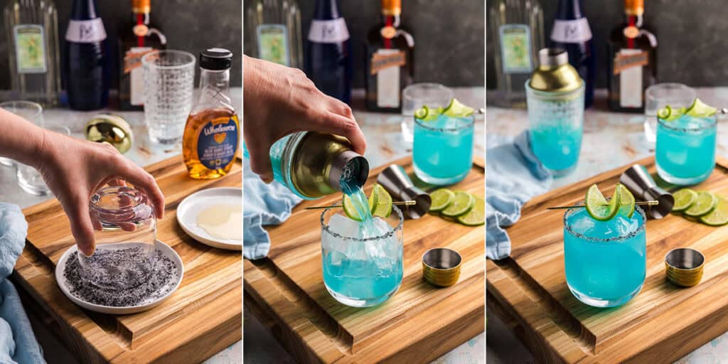 Three side by side pictures showing the process of making a blue margarita. The picture on the left is of a low ball glass having its rim dipped into a black salt and sugar mixture. The middle picture is of the same low ball glass now filled with ice and blue margarita being poured into it from a shaker. The picture on the right is of the blue margarita cocktail in a low ball glass filled with ice and rimmed with black salt and sugar. A pick with a skewered lime wheel is sitting on top.