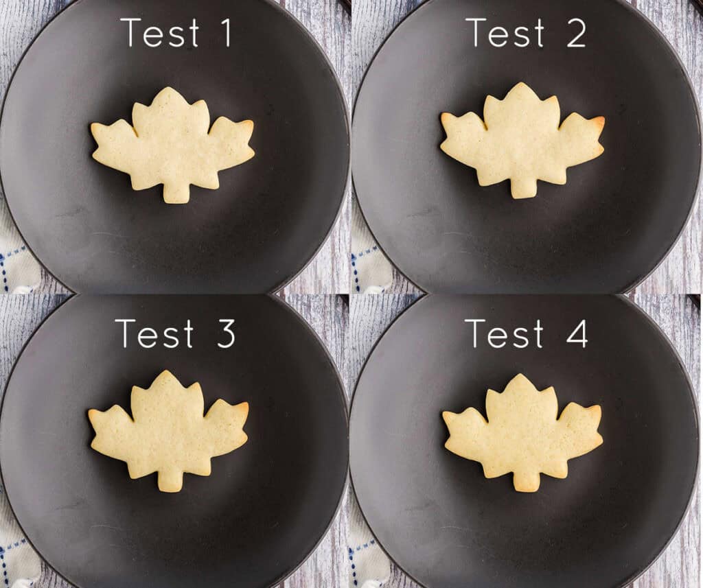 Testing out whether chilling the sugar cookie dough is necessary.  Top left corner, test 1, no chilling, the maple leaf cookie has spread a bit, and edges are clear but a bit close together where they have signs of spreading.  Top right picture, test 2, is a cookie where the dough wasn't chilled, but the cookie cut-outs were chilled.  The spread is still there, but less so than in test 1.  Bottom left picture, test 3, is where the dough was chilled but the cut-outs were not.  The maple leaf cookie is sharper than either test 1 or 2.  Picture bottom right is test 4, the sugar cookie dough was chilled and so were the cut-outs.  The edges are the sharpest in this cookie with very little spread.